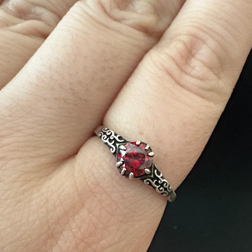 Elegant Silver Ring with Red Gemstone
